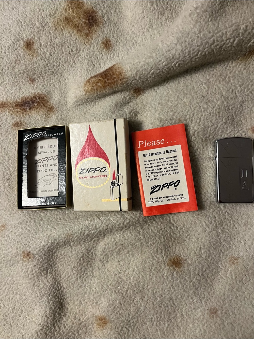 Zippo Silver Lighter with Red and Black Vintage Packaging